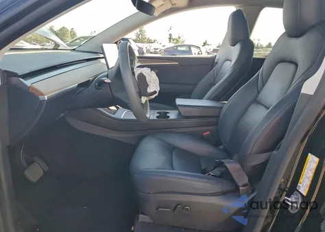 2025 Tesla Model Y from USA, damaged, VIN 7SAYGDED9SF270787